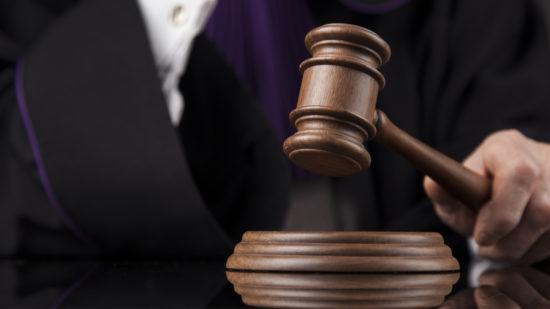 Courtroom,,Judge,,Male,Judge,In,Black,Mirror,Background