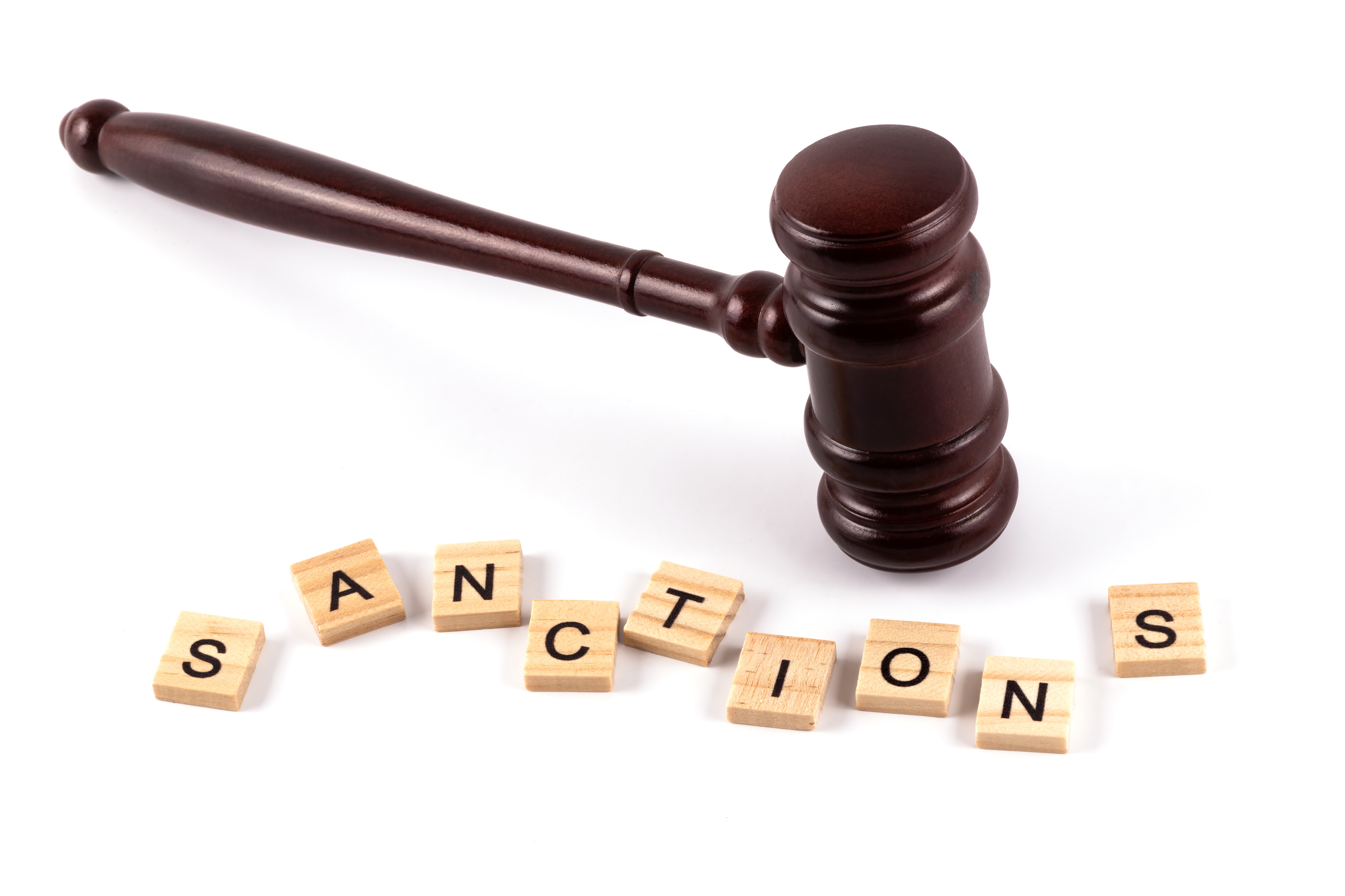 Judges,Gavel,And,The,Word,"sanctions",On,A,White,Background
