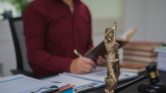 An,Asian,Male,Lawyer,Meticulously,Reviews,Legal,Documents,,Ensuring,Accuracy