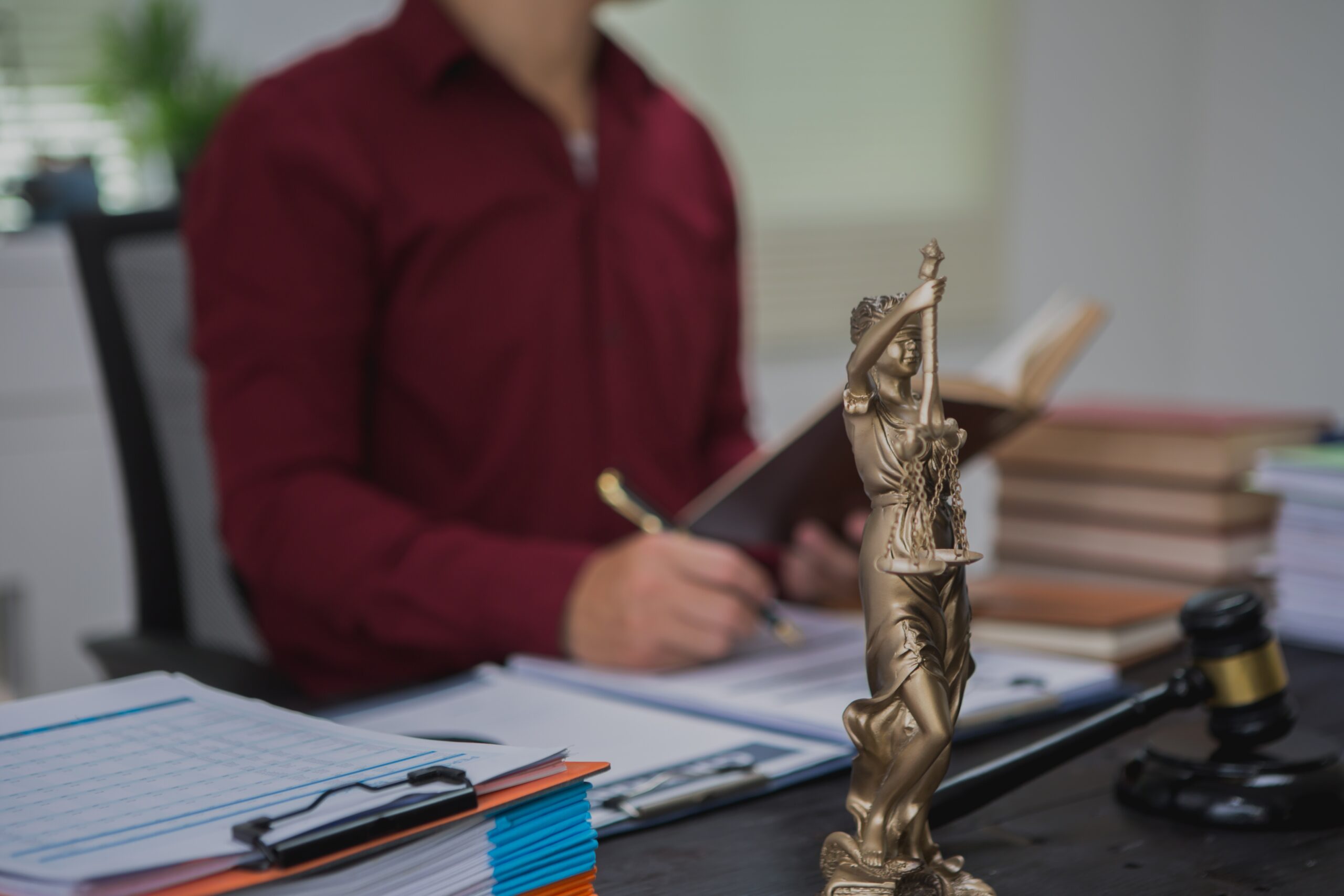 An,Asian,Male,Lawyer,Meticulously,Reviews,Legal,Documents,,Ensuring,Accuracy