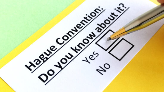 One,Person,Is,Answering,Question,About,Hague,Convention.