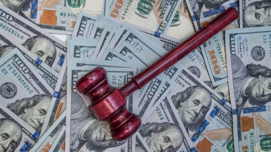 Judicial,Gavel,On,Us,Dollars,Background,For,Business,Arbitration,And